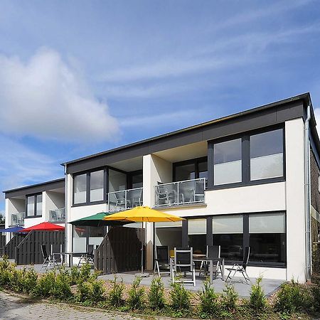 Haus Kunterbunt Apartamento Bensersiel Exterior foto