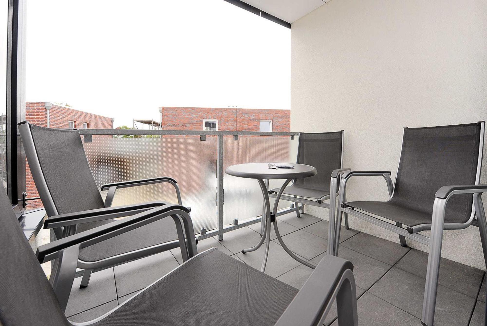 Haus Kunterbunt Apartamento Bensersiel Exterior foto
