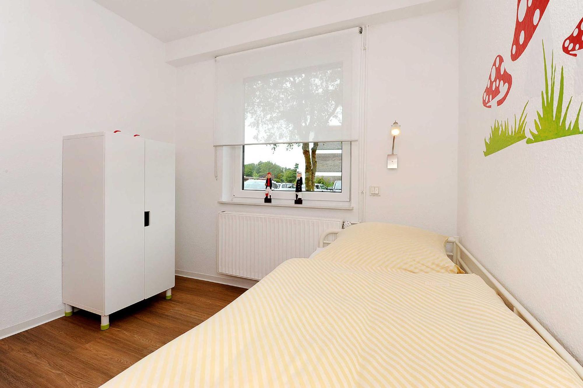 Haus Kunterbunt Apartamento Bensersiel Exterior foto