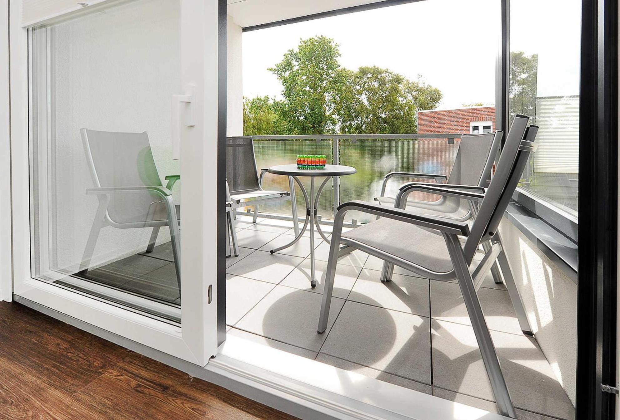 Haus Kunterbunt Apartamento Bensersiel Exterior foto