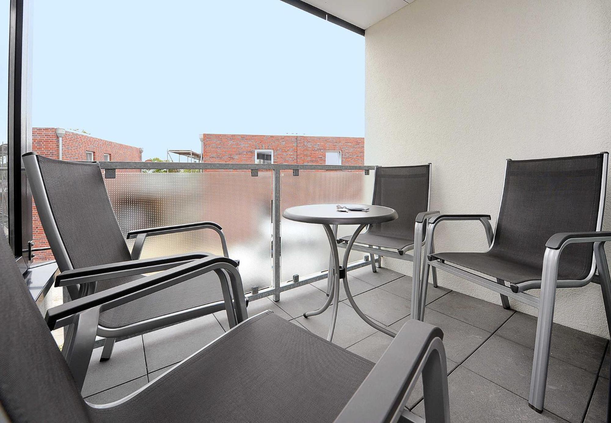 Haus Kunterbunt Apartamento Bensersiel Exterior foto